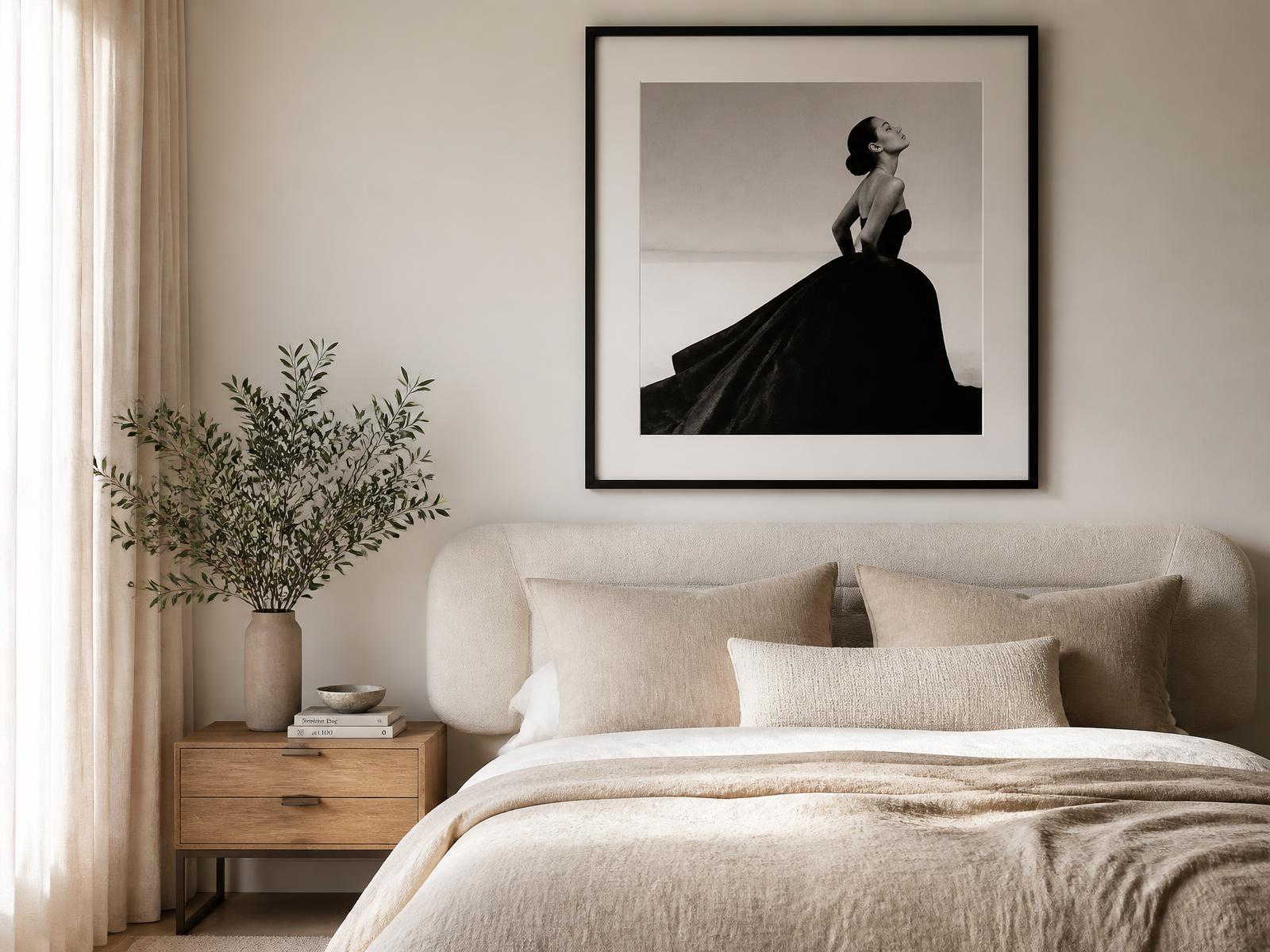 Wall art hung above the bedhead